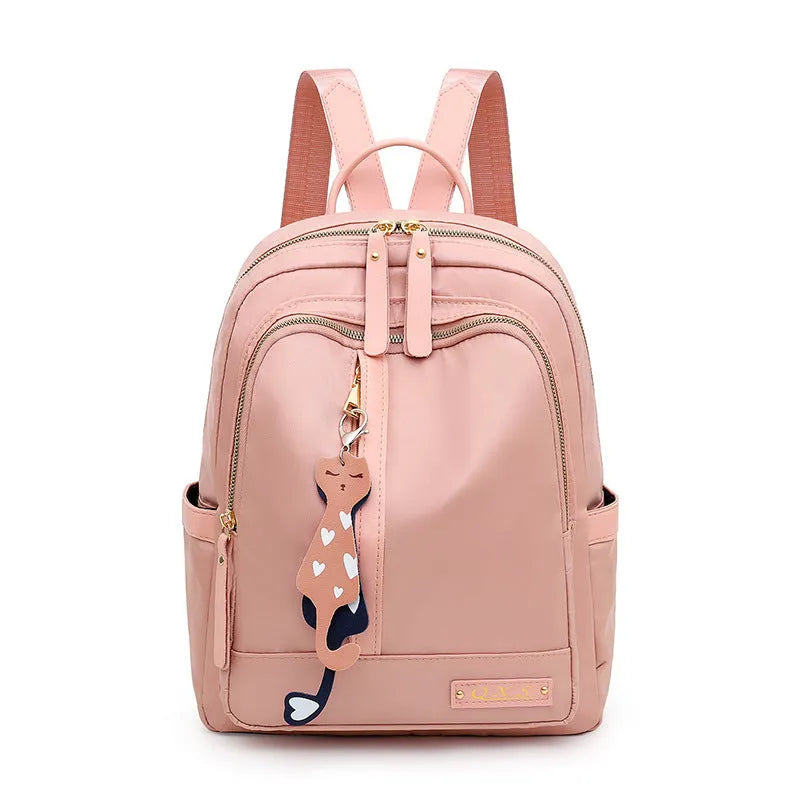 Men's black casual backpack showing multiple compartments and shoulder straps