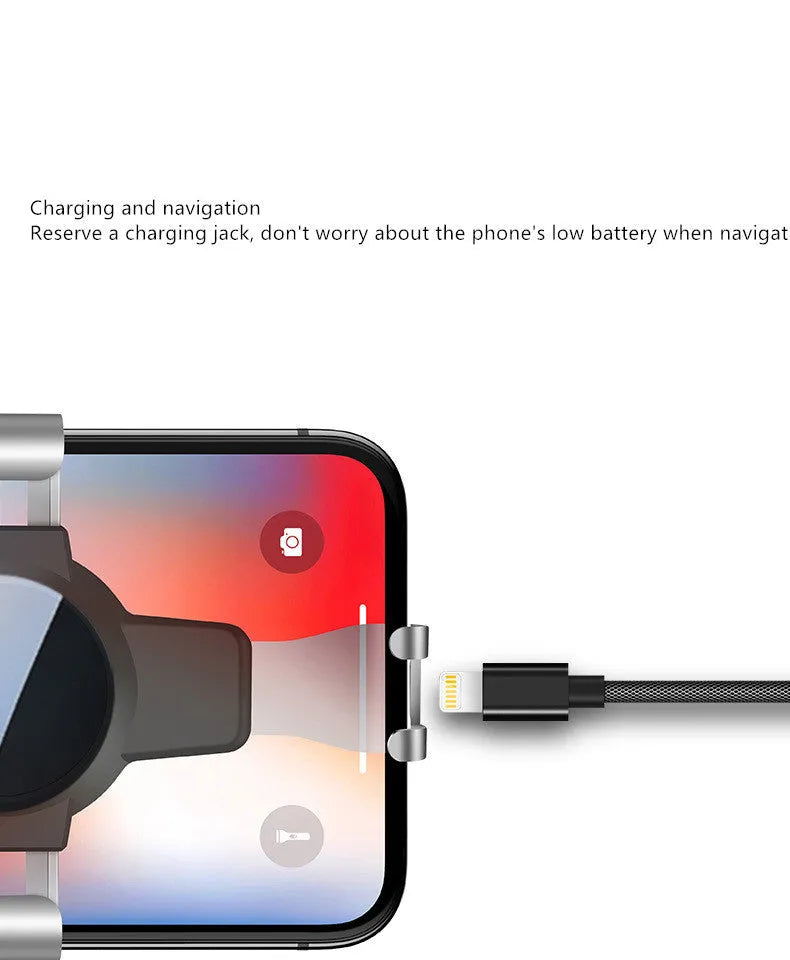 Black S4 ABS gravity mirror mobile phone bracket mounted on car air conditioning vent holding smartphone