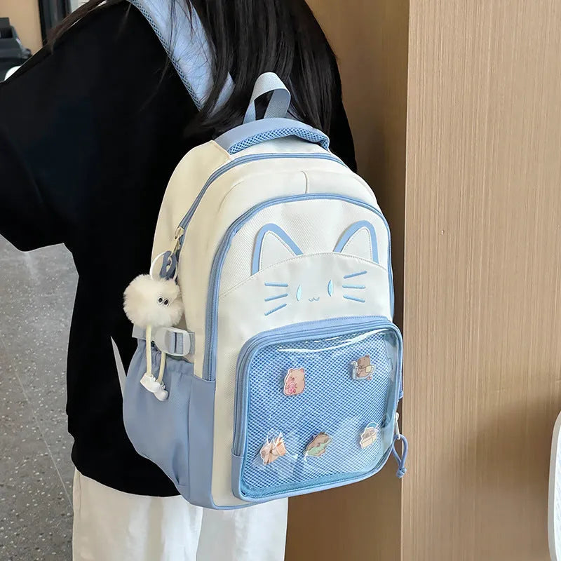 Korean cartoon anime style large capacity nylon backpack in various colours with curved shoulder straps.