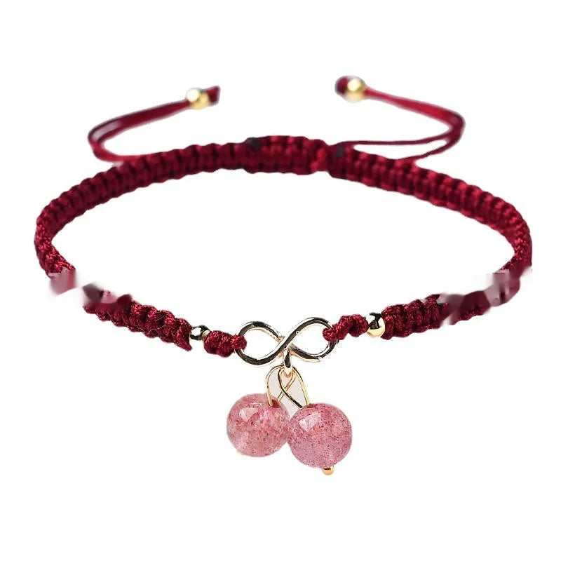 Women's natural crystal bracelet with fruit-shaped beads in strawberry quartz, amethyst, or green phantom quartz.