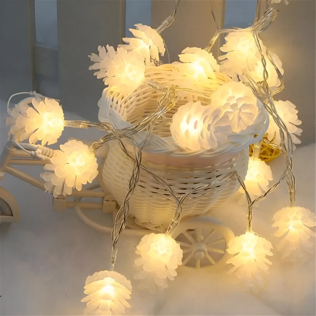 Battery-powered LED light string with plastic pine cone shells, shown in warm white and colour options.