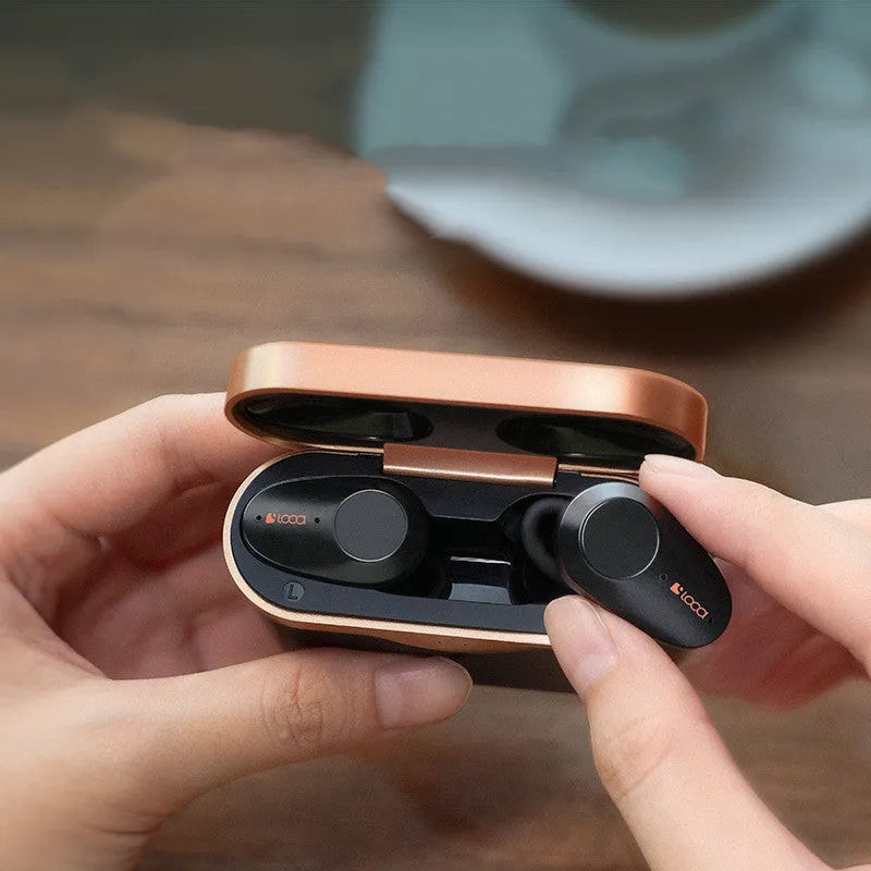 Black wireless bluetooth headset with charging stand featuring ANC and type-C wireless charging capabilities