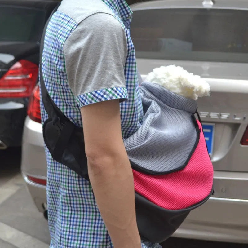 Polyester pet backpack carrier for a small dog or cat, shown in blue colour.