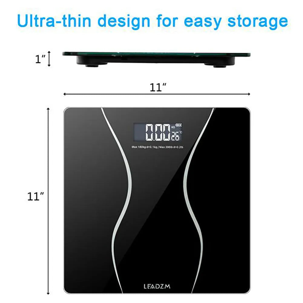 Black electronic bathroom scale on a floor, showing digital display and low-profile platform design.