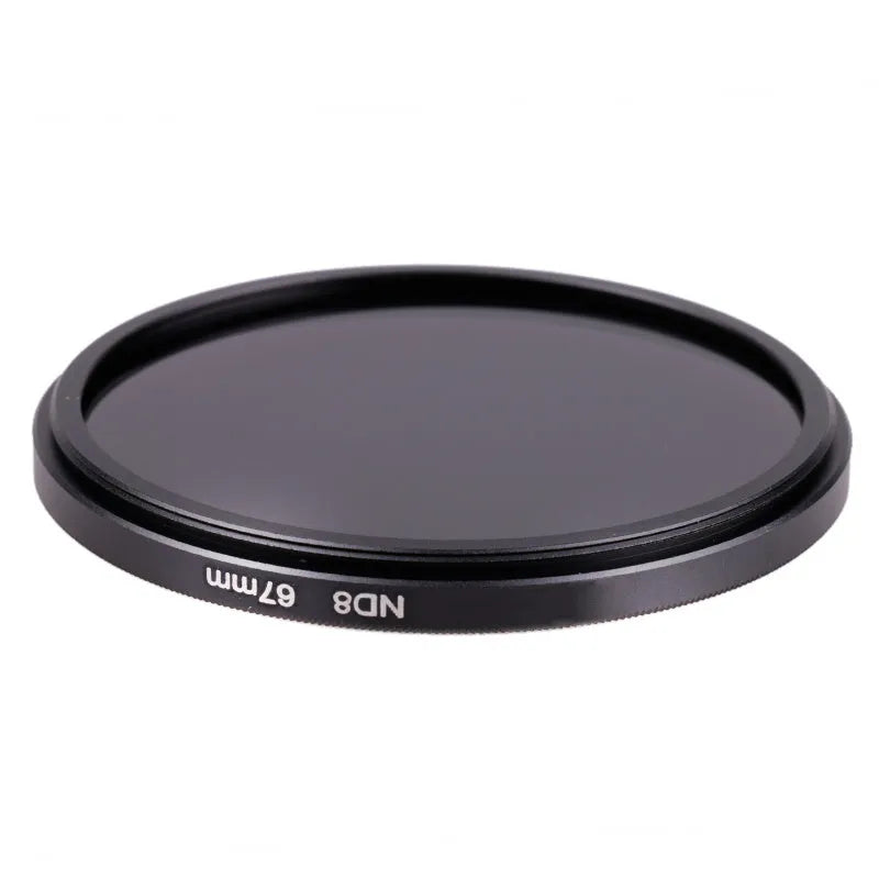 ND8 camera lens filter with aviation aluminium frame shown next to a camera lens