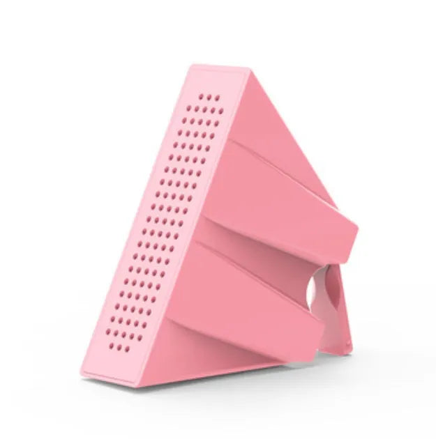 ABS mini mobile phone amplifier bracket in pink, holding a smartphone horizontally on a desktop.