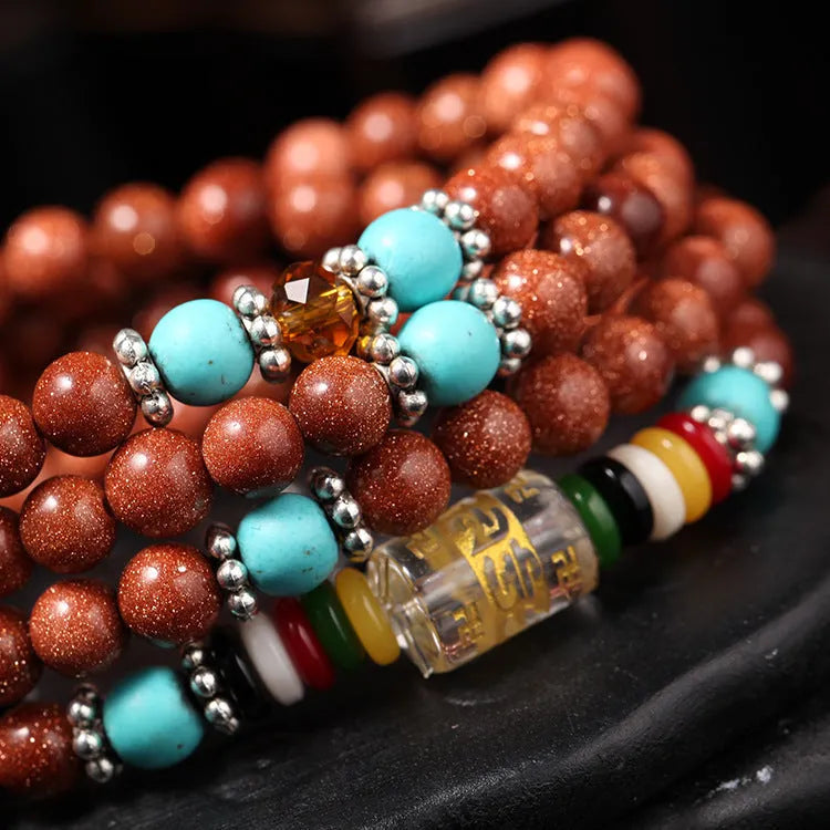 Golden star stone women's mantra bracelet with 108 nugget sand pieces and fu character design