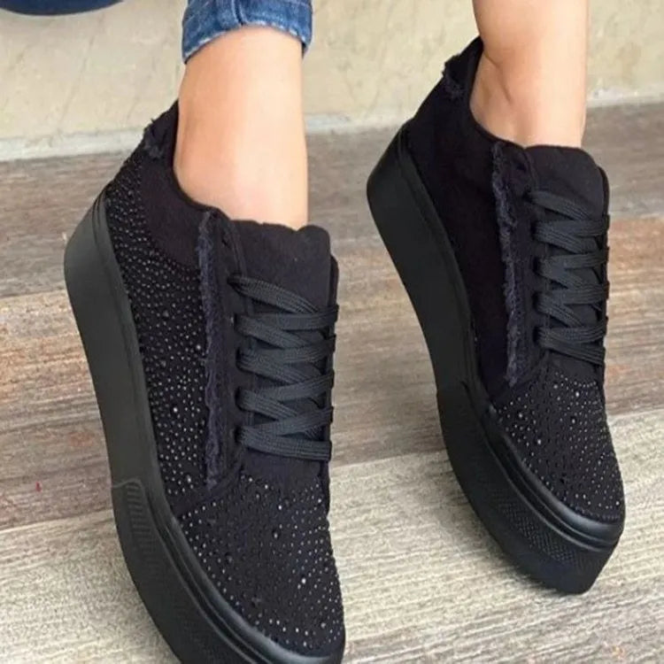 Plus size women's casual sports shoes with rhinestone detail, thick rubber sole, and lace-up closure in solid colour