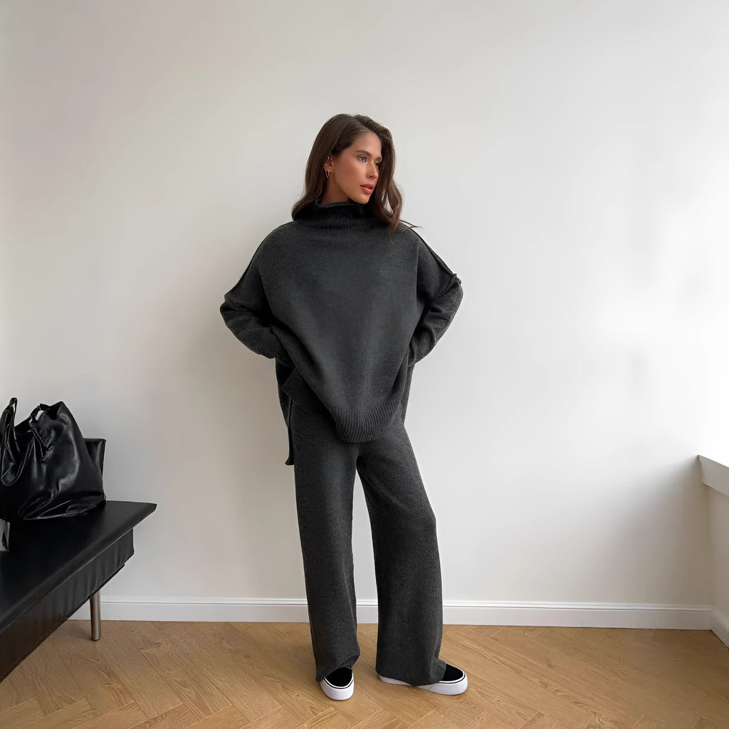 Women's dark grey side-slit sweater with matching trousers two-piece suit on hanger