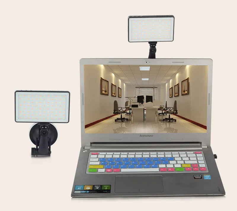 Black aluminium LED video conference light with 96 LEDs, OLED screen, and Type-C port for laptop calls.