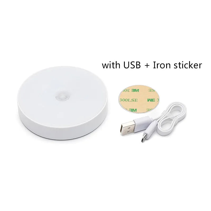 Small round beige or white LED night light with motion sensor and USB charging port