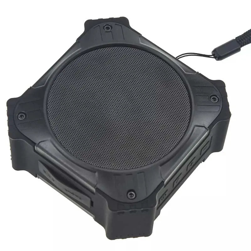 Compact circular waterproof Bluetooth speaker in black or blue with wrist strap