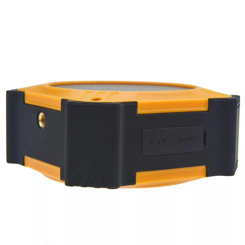 Compact circular waterproof Bluetooth speaker in black or blue with wrist strap