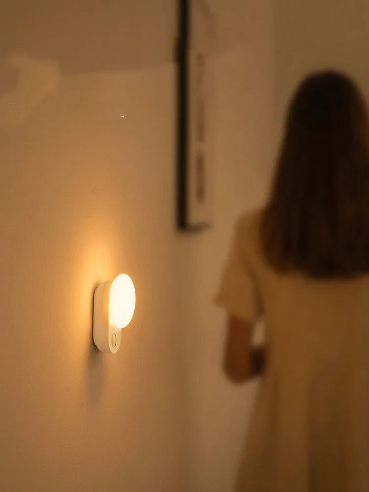 White rechargeable sensor night light with motion detection for bedroom use