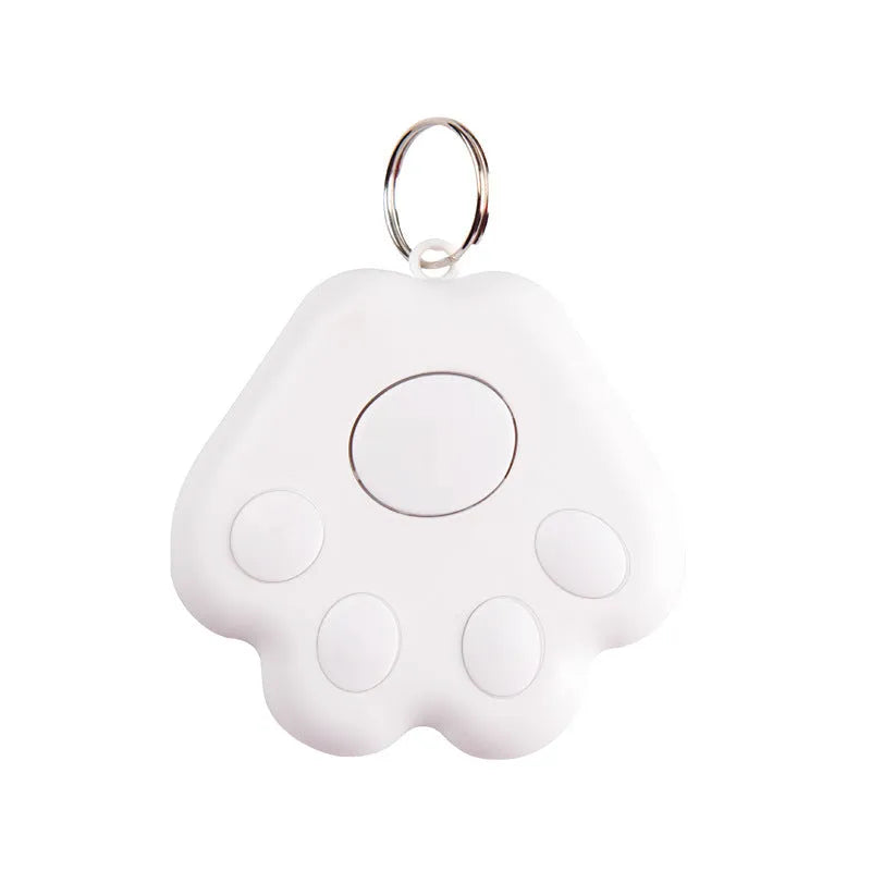 Dog paw shaped Bluetooth anti-lost device in various colours, shown with mobile phone for scale.