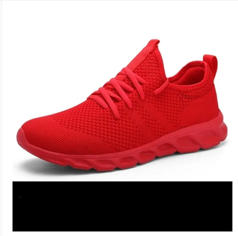 Men's black and white breathable sneakers with mesh upper and lace-up closure for casual sport