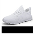 Men's black and white breathable sneakers with mesh upper and lace-up closure for casual sport