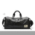 Black waterproof PU leather sports training bag showing internal organisation pockets and shoulder strap