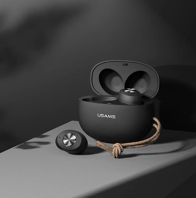 Pebble Series mini TWS wireless Bluetooth earbuds in charging case, shown in black, white, and dark green.