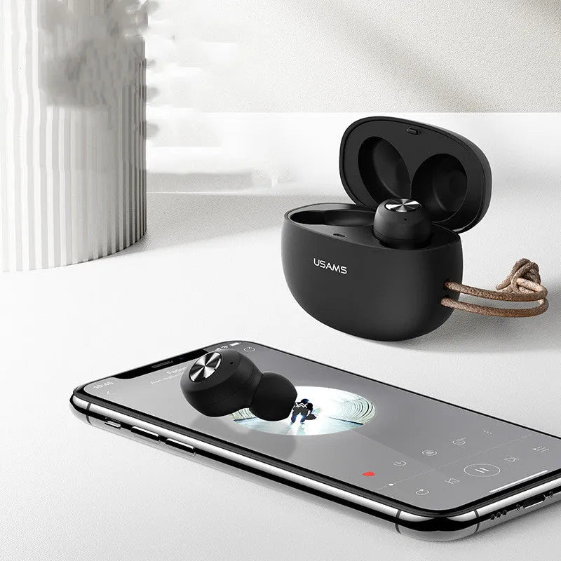 Pebble Series mini TWS wireless Bluetooth earbuds in charging case, shown in black, white, and dark green.