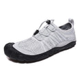 Breathable mesh water shoes with rubber sole and elastic closure for river tracing and outdoor sports