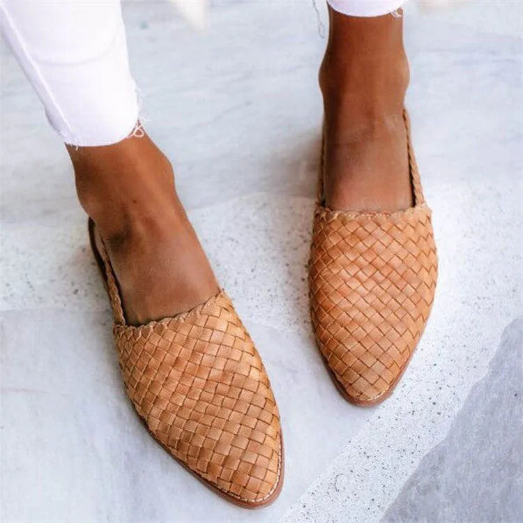 Women's flat sandals with an adjustable buckle strap and pointed toe in a selection of colours.