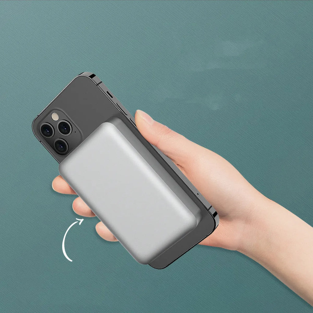 Silver aluminium Apple-compatible magnetic wireless charging power bank showing USB-C port.