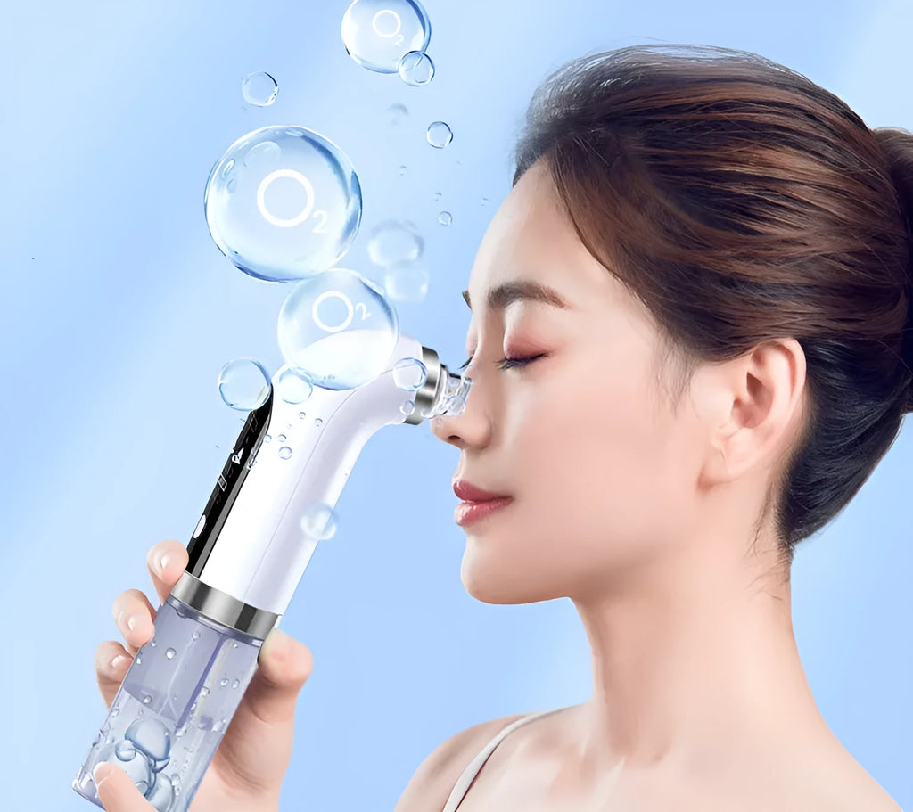 Rechargeable blackhead remover vacuum with six replaceable probes, five suction levels, white colour, and USB charger.