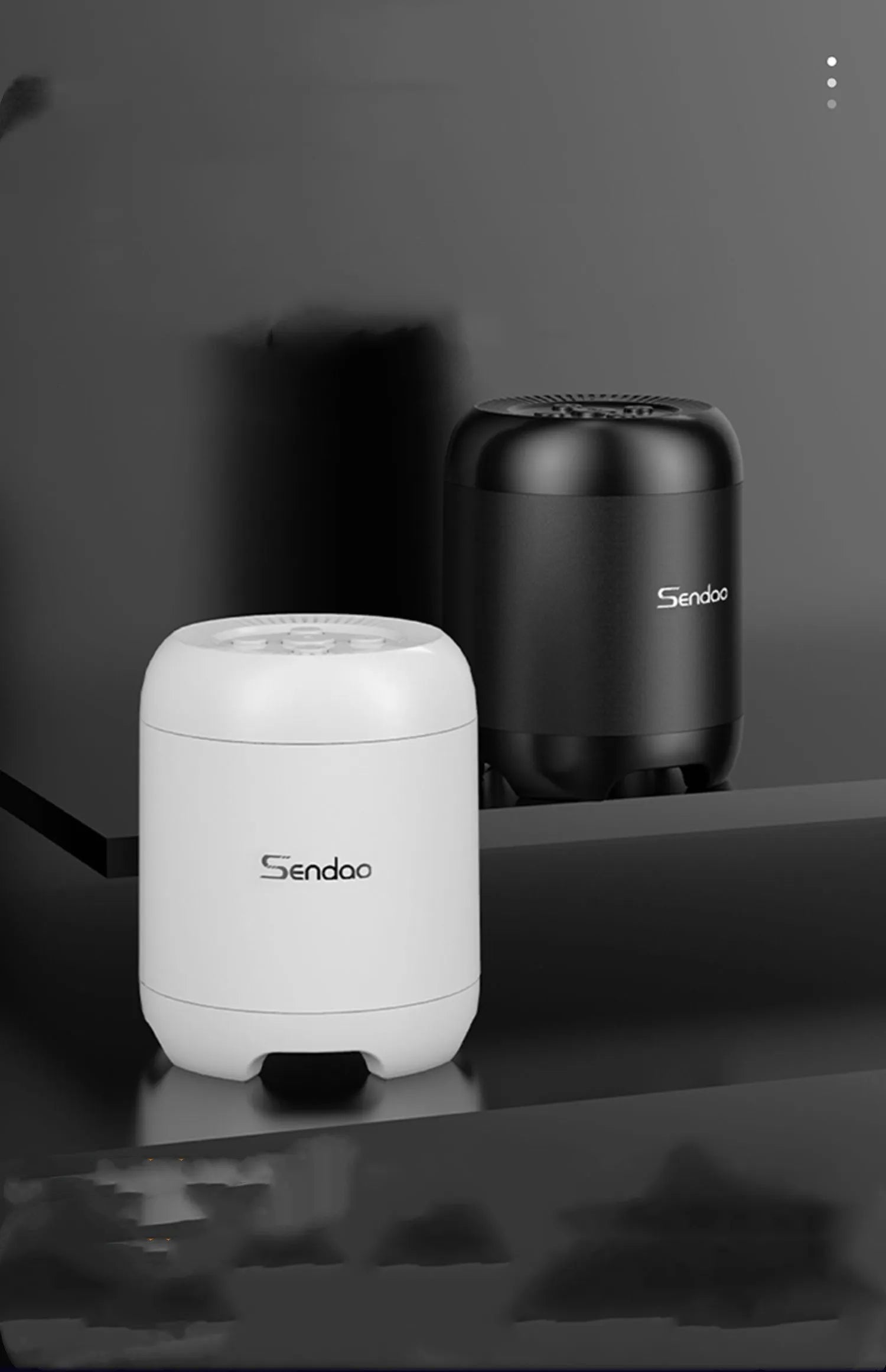 Compact black or white wireless Bluetooth speaker with subwoofer, card reader, and USB port