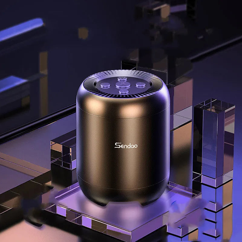 Compact black or white wireless Bluetooth speaker with subwoofer, card reader, and USB port