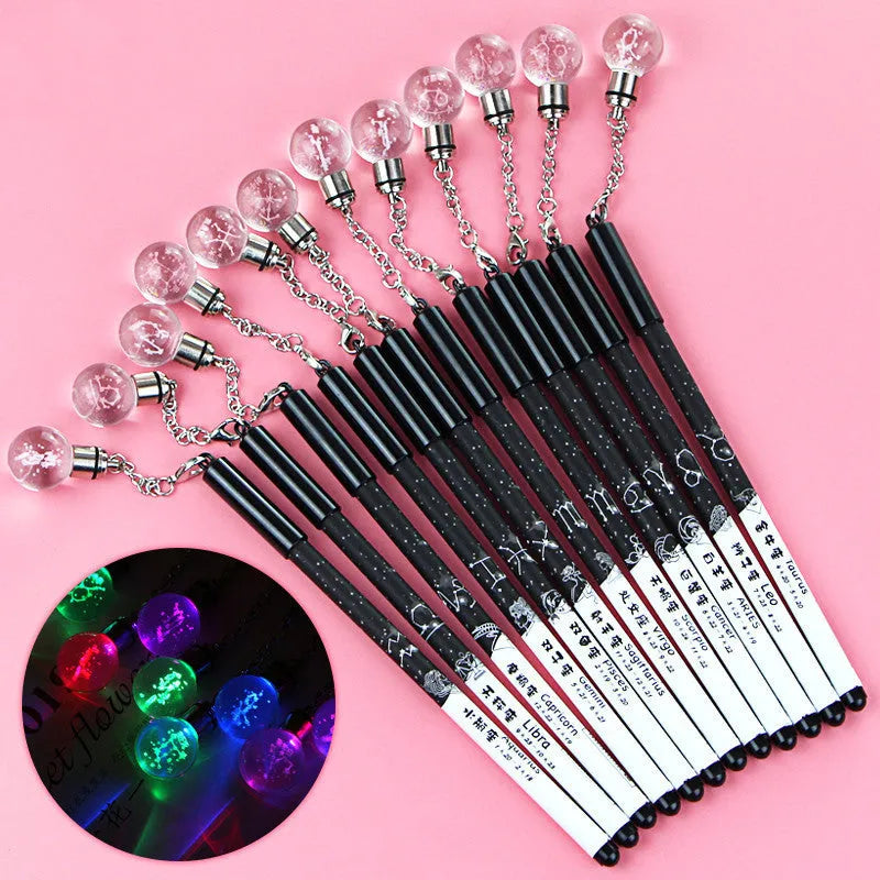 Twelve constellation-themed gel pens with full syringe needle-tube construction and 0.5mm black refills