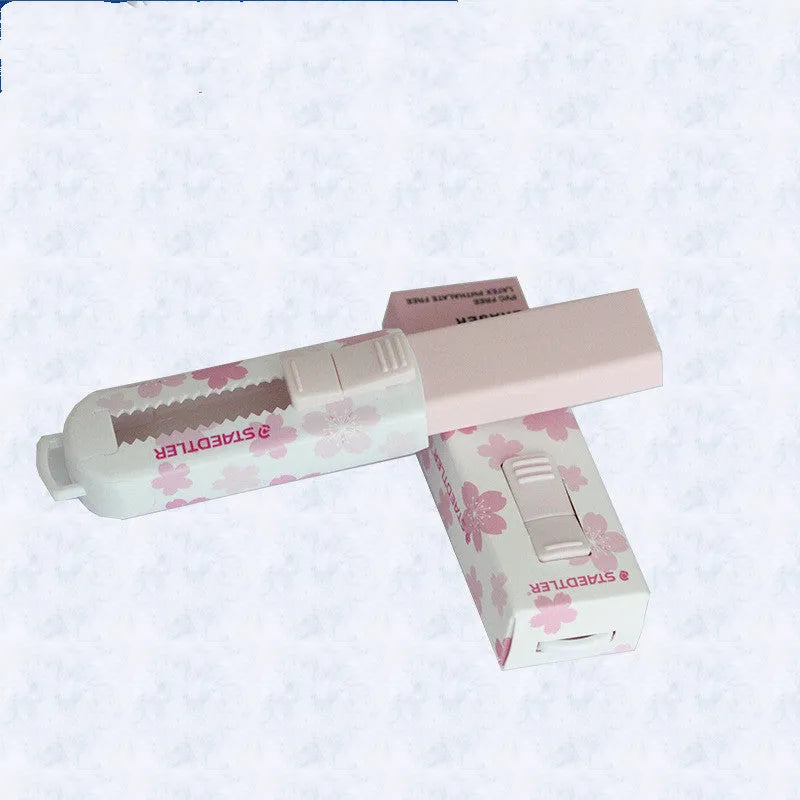 Square pink push-pull whiteboard rubber with replaceable core, showing dimensions 86mm x 26mm x 22mm.