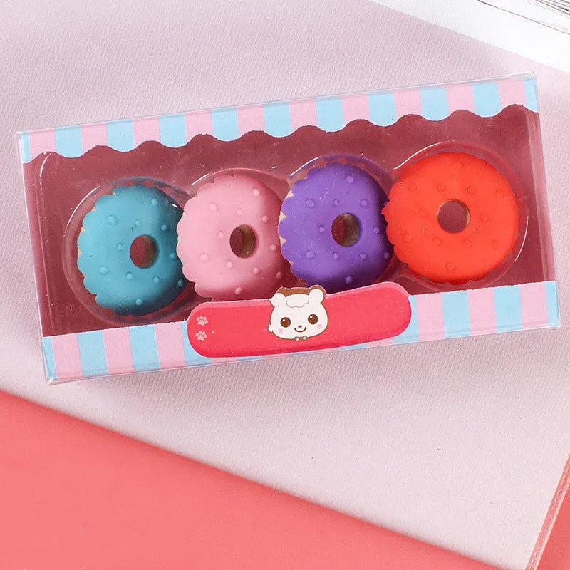 Set of 12 cartoon character rubber erasers with cone, ice cream, donut, and lollipop designs for children