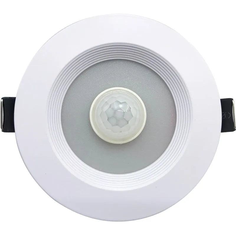 Aluminium recessed ceiling down light with infrared motion sensor for automatic white LED lighting.