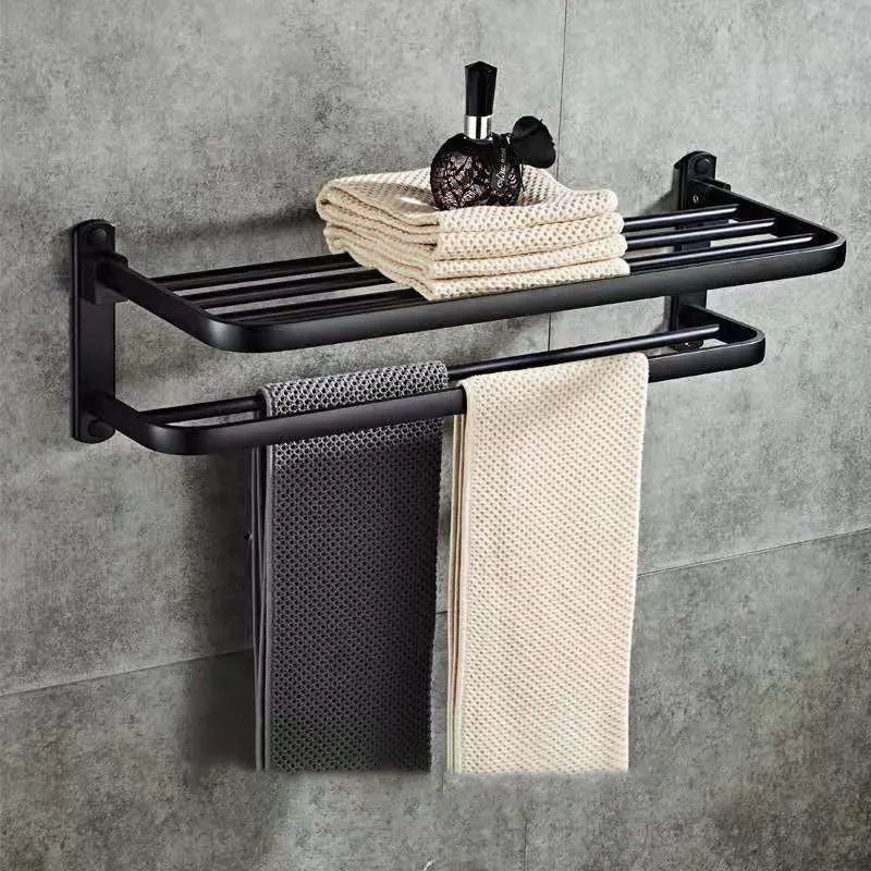 Aluminium bathroom folding shelf with two tiers and perforated rails, shown in a light luxury style.