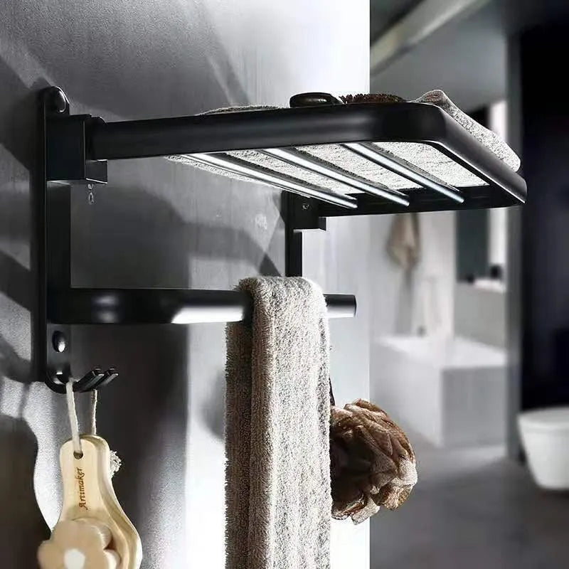 Aluminium bathroom folding shelf with two tiers and perforated rails, shown in a light luxury style.