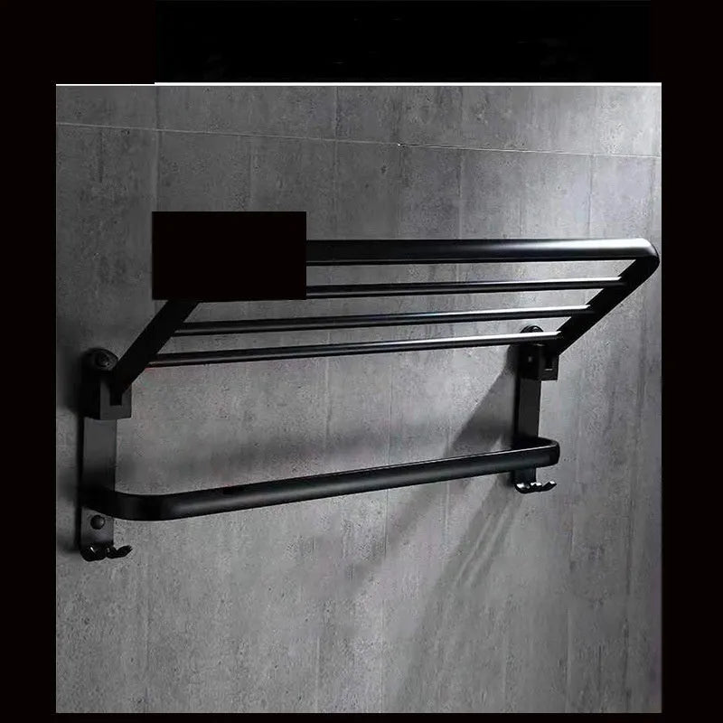 Aluminium bathroom folding shelf with two tiers and perforated rails, shown in a light luxury style.