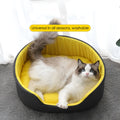 Green cloth enclosed pet kennel bed for dogs or cats showing raised sides.