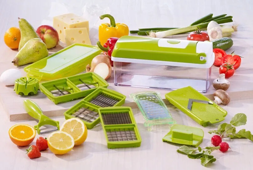 Green 12-piece manual food chopper set with stainless steel blades on a kitchen counter.