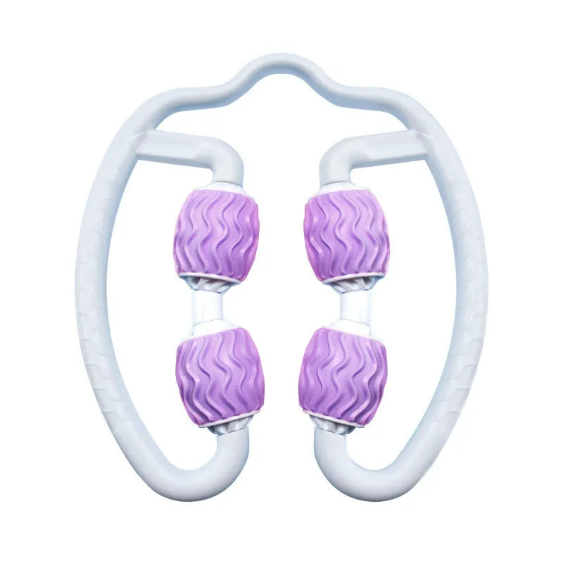 Purple and pink annular silicone leg massage roller for fitness recovery.