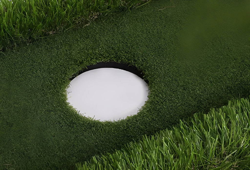 Green golf practice mat with artificial turf on a cushioned EVA foam base.