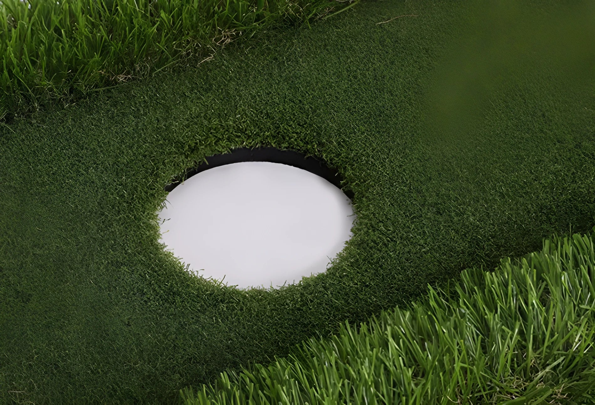 Green golf practice mat with artificial turf on a cushioned EVA foam base.