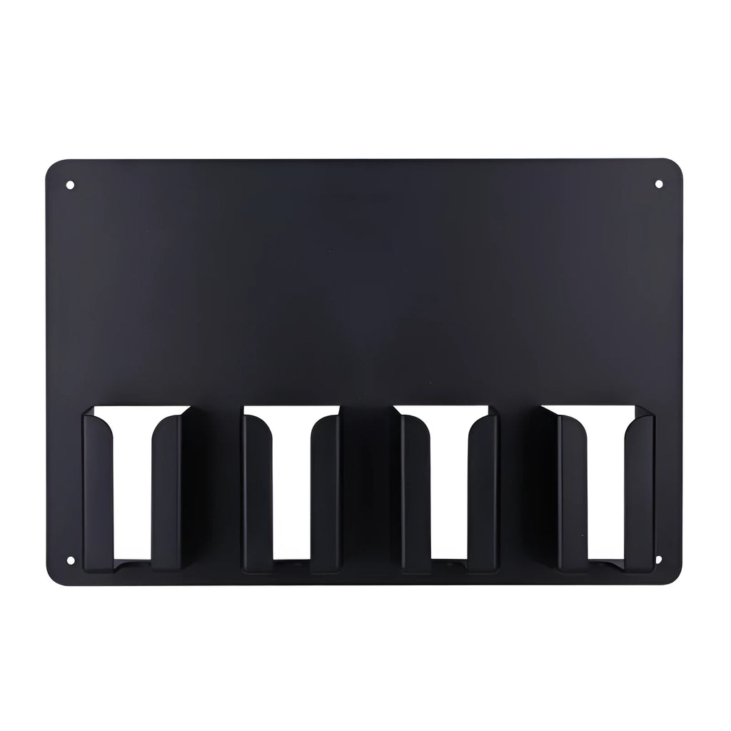 Black plastic wall-mounted rack holding four electric hair clippers