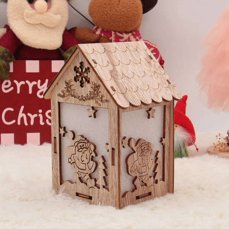 Natural wood Christmas decoration set showing small bell and large house designs with Old Man and snowman.