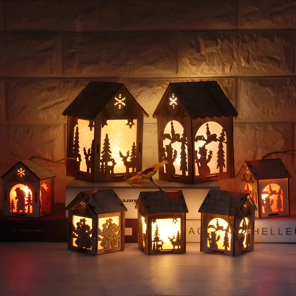 Natural wood Christmas decoration set showing small bell and large house designs with Old Man and snowman.