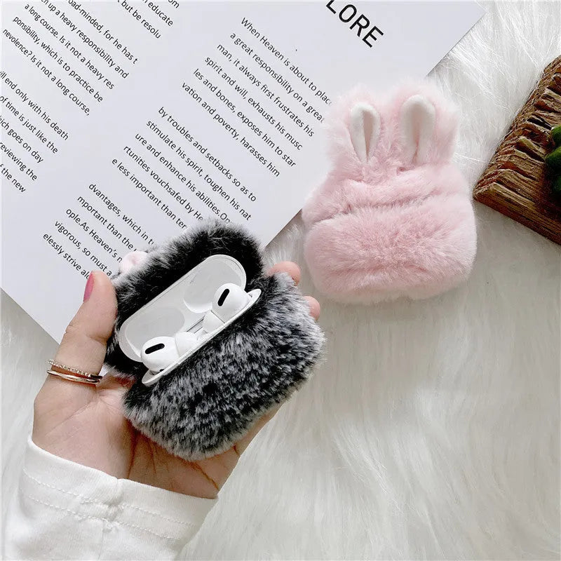 Pink rabbit ear silicone protective cover on Apple AirPods case
