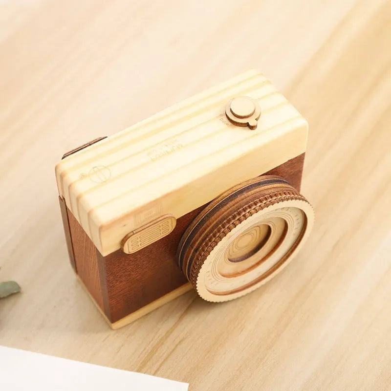 Wooden camera-shaped music box with rotating mechanism and mini carton packaging