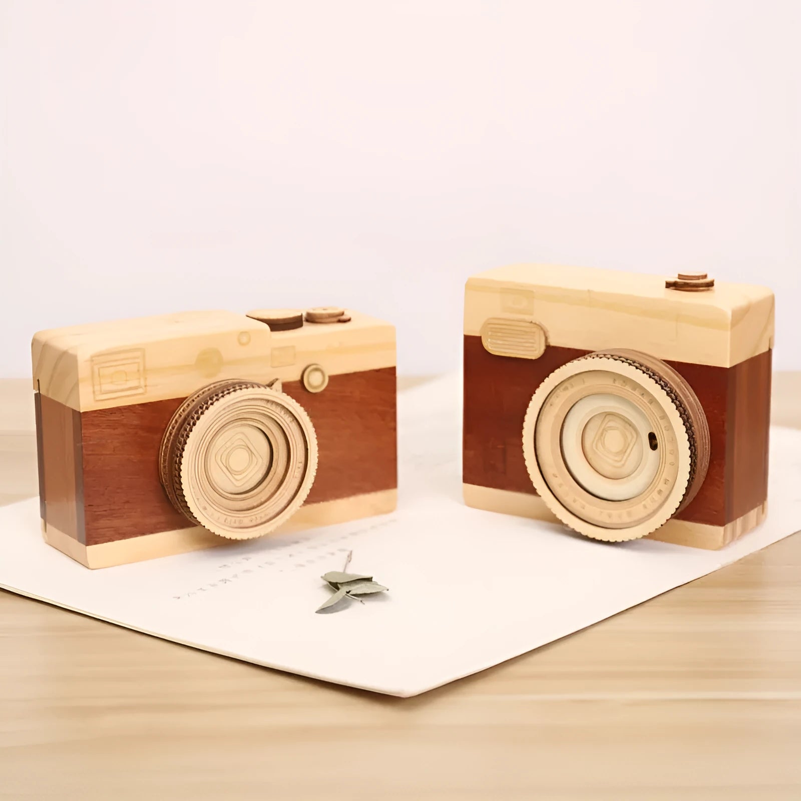 Wooden camera-shaped music box with rotating mechanism and mini carton packaging