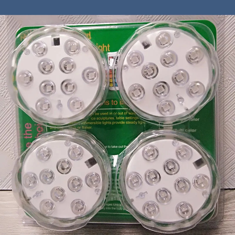 White disc-shaped waterproof LED light with remote control for garden and pool decoration