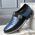 Men's large size black leather casual low-top shoes on a white background.